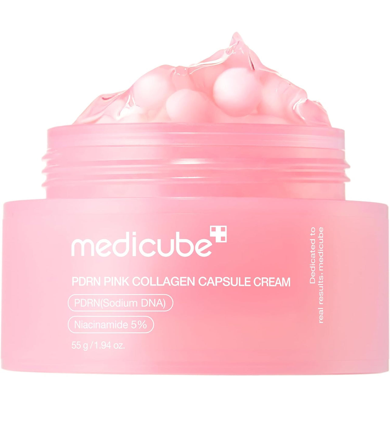 Close-up of Medicube PDRN Pink Collagen Capsule Cream with visible pink capsules inside a transparent gel base